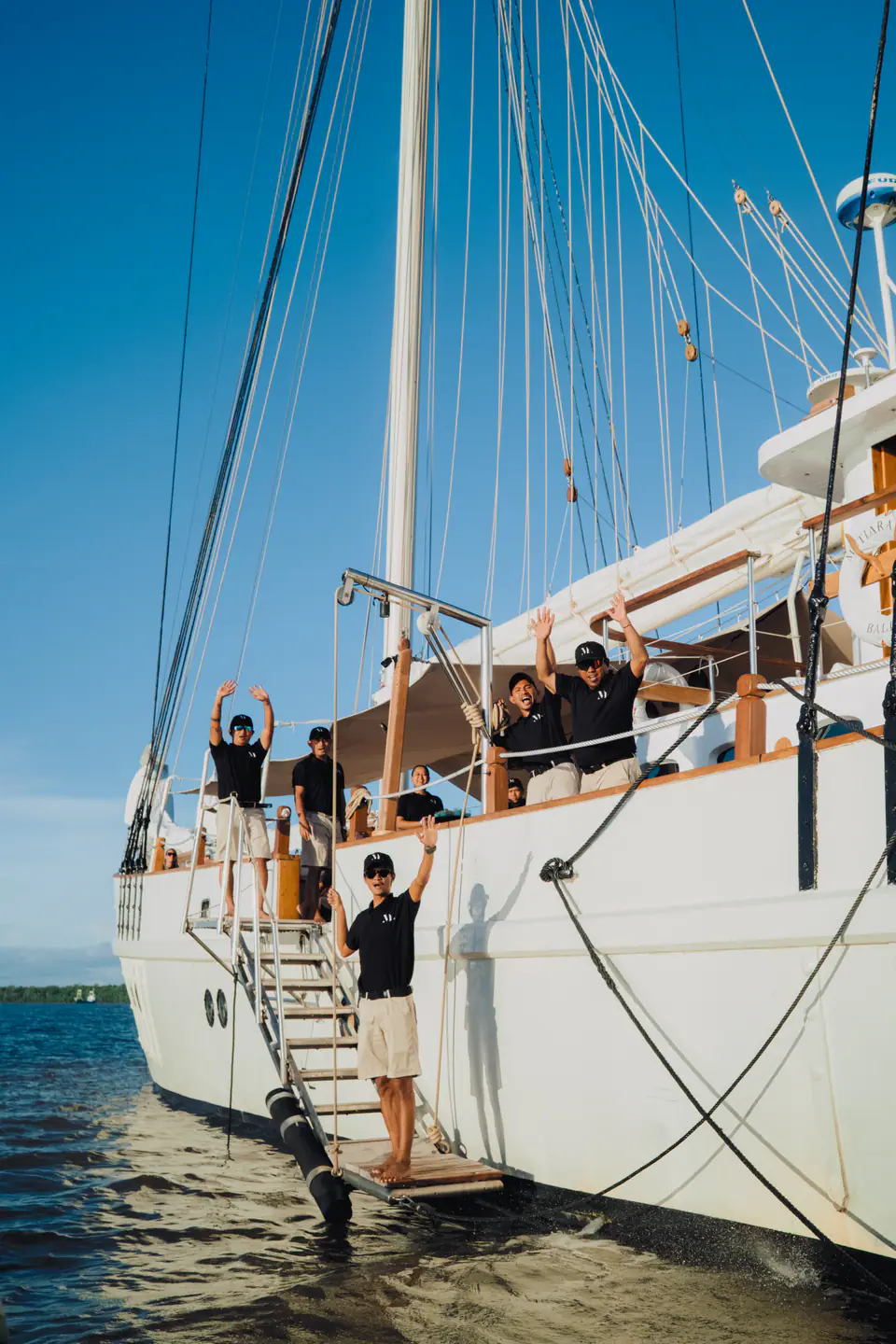 The Crew of Mutiara Laut Saying Hi from the boat