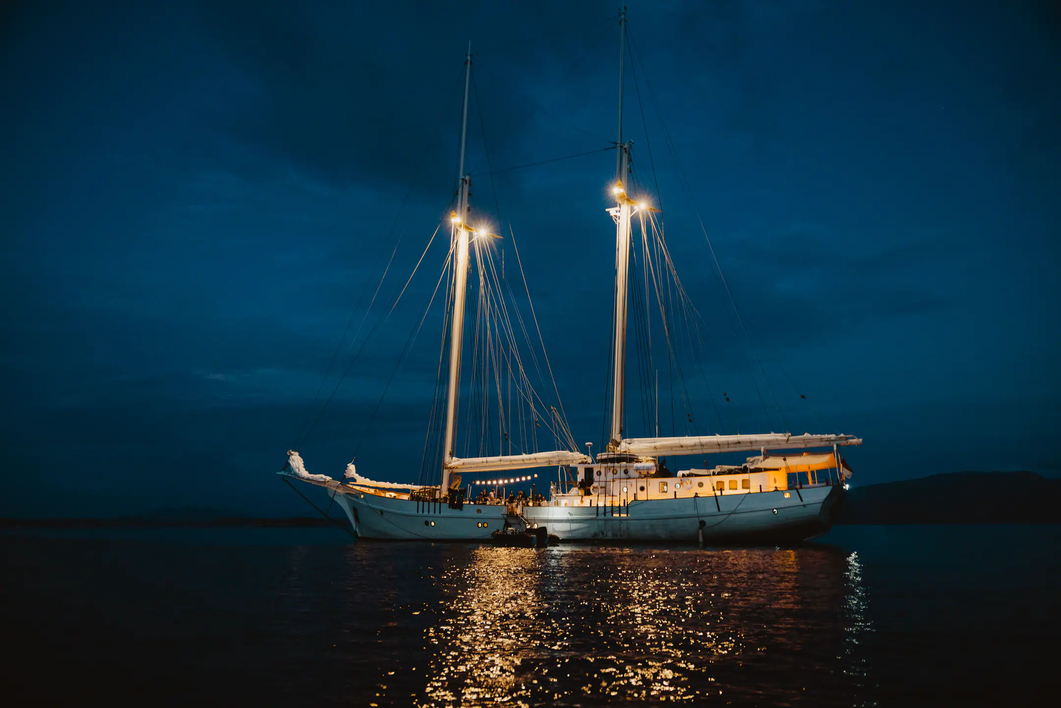 Mutiara Laut stern view highlighting the classic schooner yacht design.
