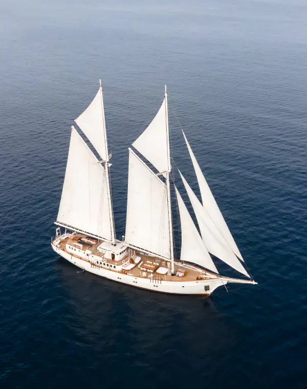 Majestic Mutiara Laut sailing in Indonesian seas with her 7 sails out.