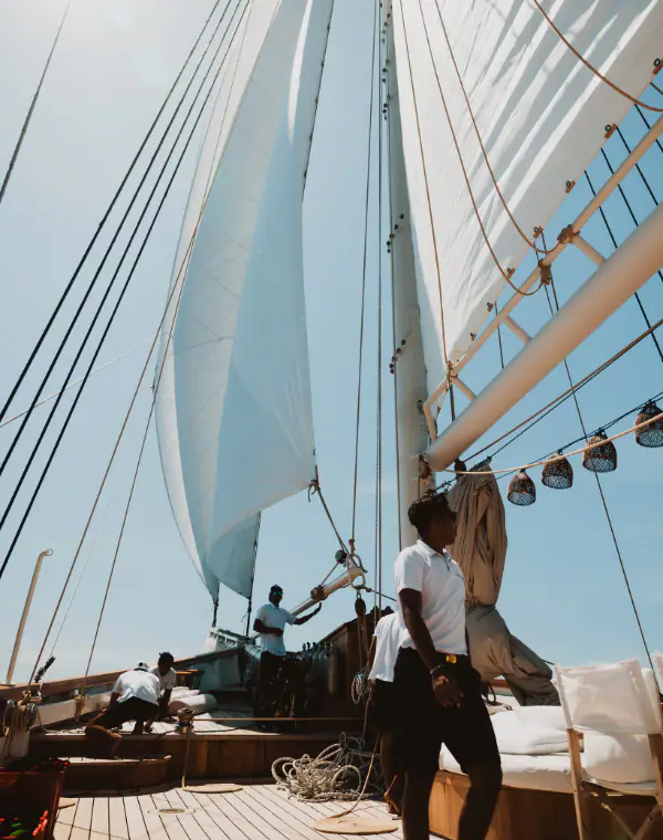 The crew of Mutiara Laut is working on the main deck.