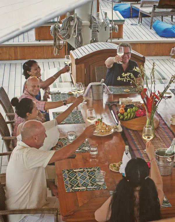 The first guest of Mutiara Laut history are having a private meal on the main deck.